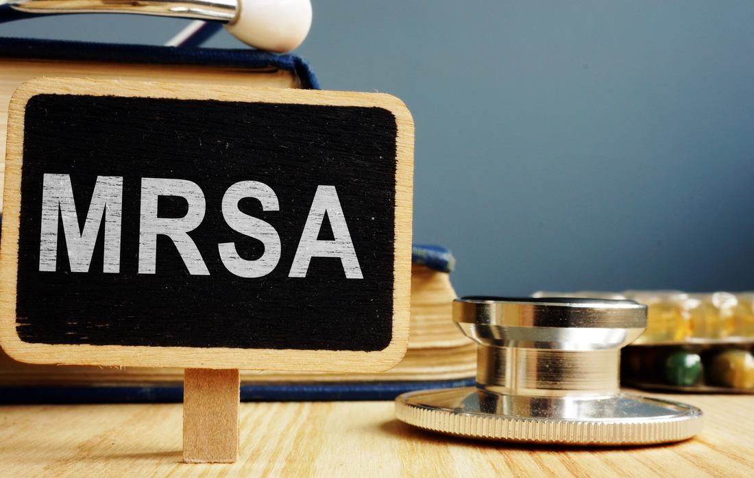 Blackboard with sign MRSA Methicillin-resistant Staphylococcus Aureus.